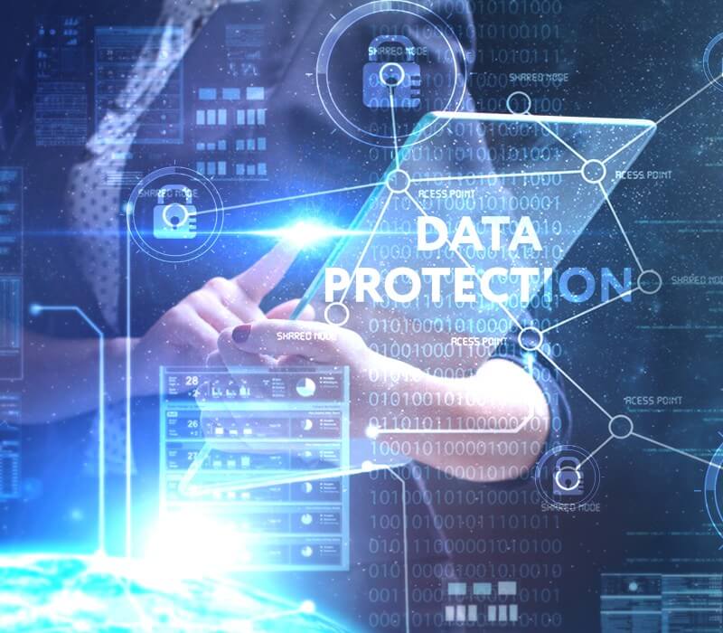 Close up of a computer with a text on data protection